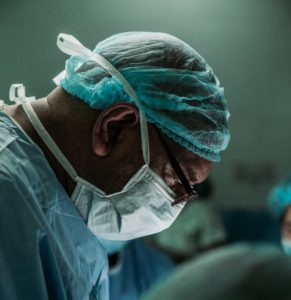 A doctor in surgical scrubs